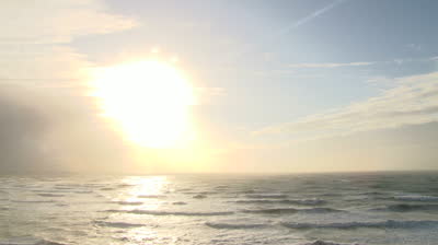 stock-footage-bright-sun-shines-over-the-pacific-ocean-on-beautiful-day.jpg