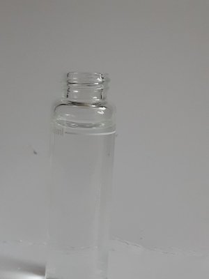 2 of the white handle 5ml syringe in vial.jpg