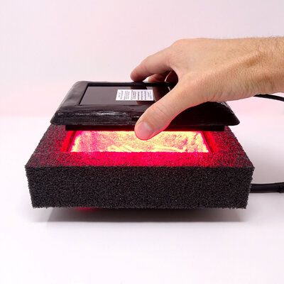 SURF2-new-hand-uncovering-lights-on.jpg