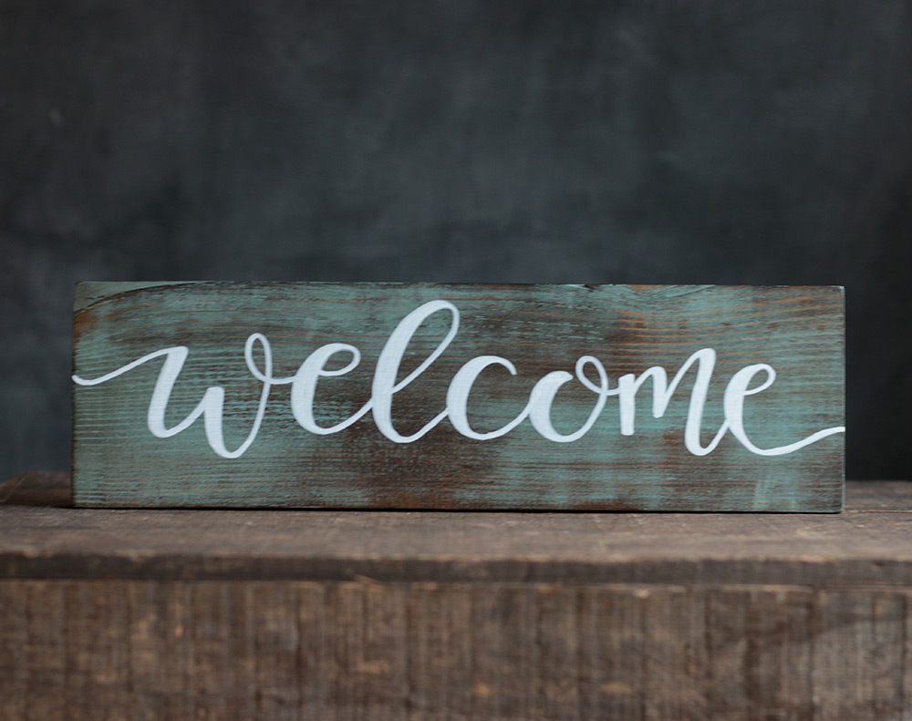 teal-welcome-sign-L.jpg