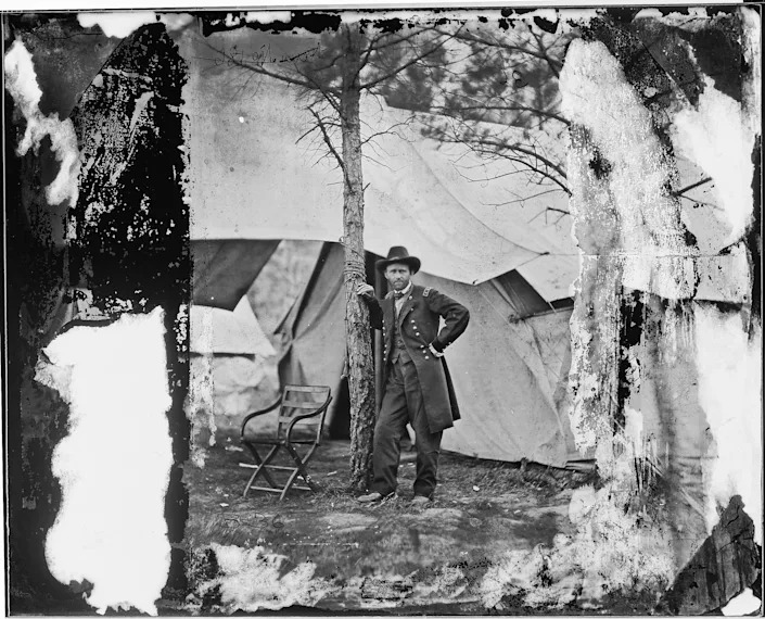 In this image from the U.S. Library of Congress, U.S. General Ulysses S. Grant stands for a portrait August, 1864 in City Point, Virginia.