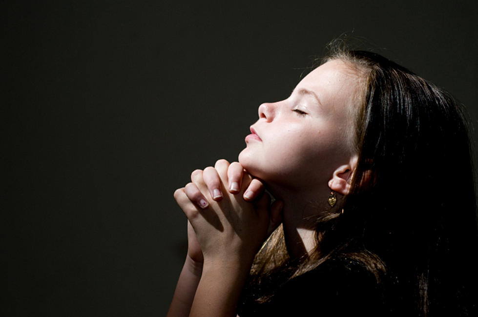 Praying-child-Charles-Ostrand.jpg