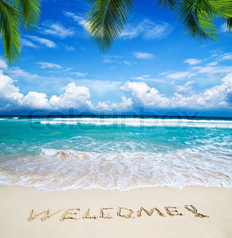 6434368-welcome-written-in-a-sandy-tropical-beach.jpg